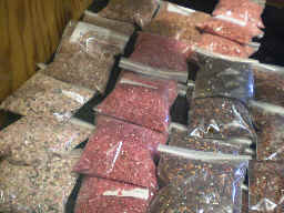 Rhodonite, coral-color quartz (D), goldstone, and 