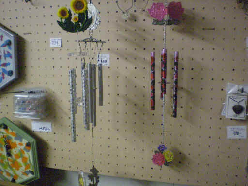 Tubular wind chimes of various motifs.