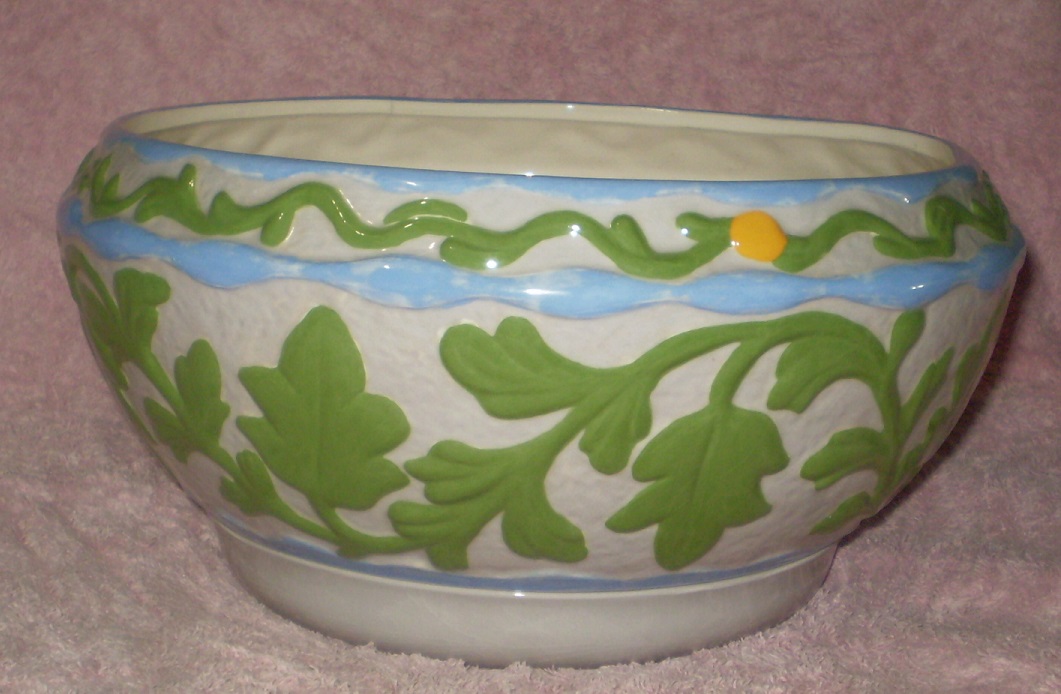Porcelain planter, 11.5 inches wide.