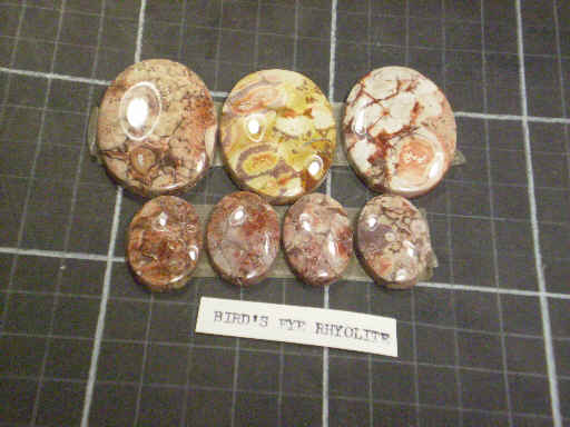Cabochons of bird's eye rhyolite.