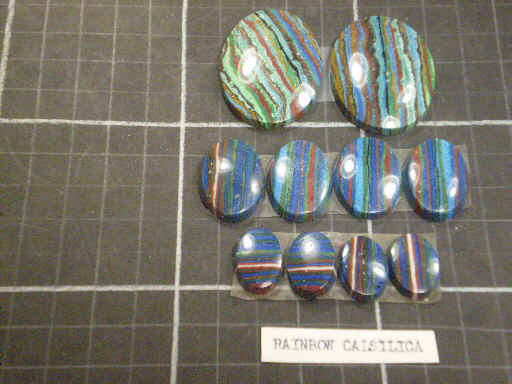Cabochons of rainbow calsilica.