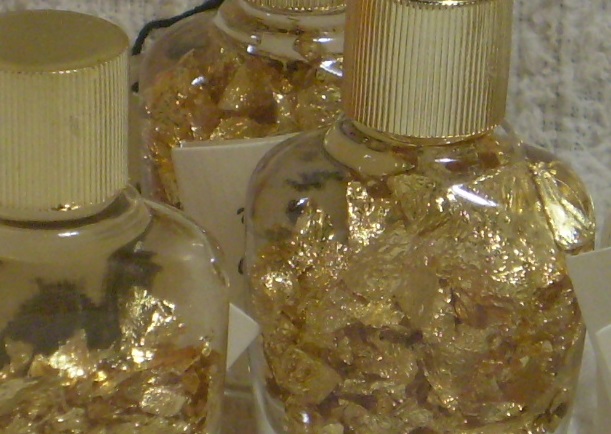 Miners' assay bottles with samples in liquid.